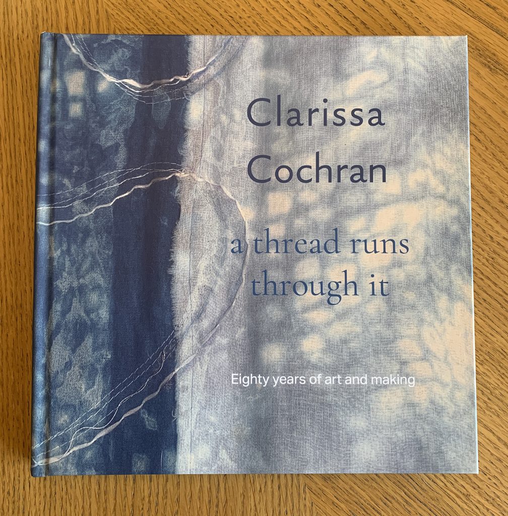 Front cover of an art book, A Thread runs through it, by Clarissa Cochran